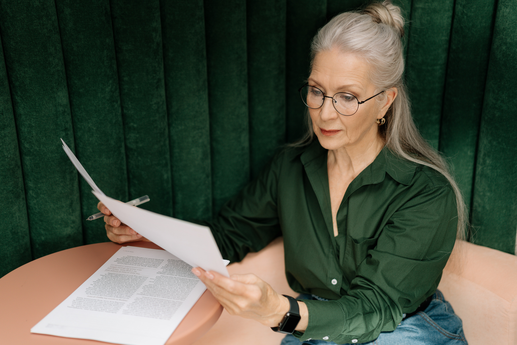 Elderly Woman With Eyeglasses Reading